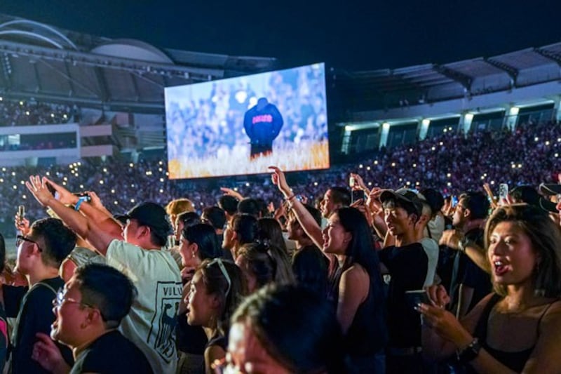 Music fans cheer during Kanye West's Vultures Listening Experience at Wuyuan River Stadium in Haikou, capital of China's Hainan province, Sept. 15, 2024. (Luo Yunfei/China News Service/VCG via Getty Images)