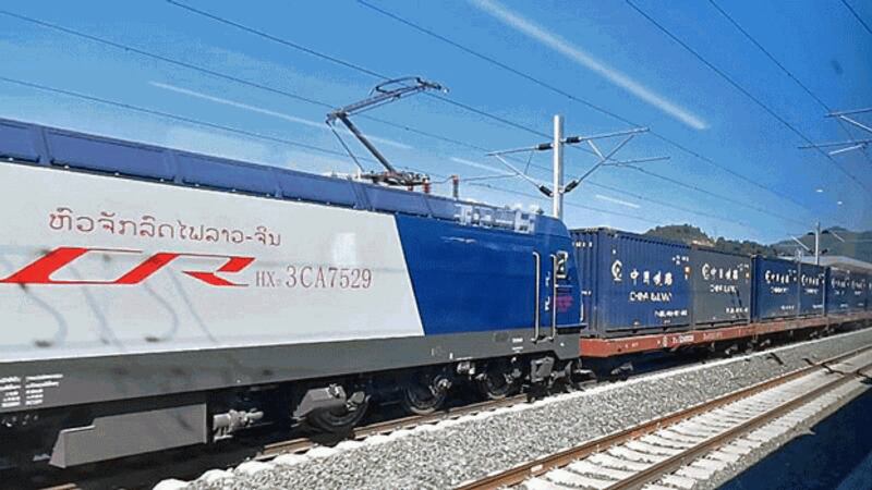 A freight train from China traveling along the Laos-China Railway stops at Vang Vieng station in Vientiane province, Laos, Dec. 4, 2021. Credit: RFA