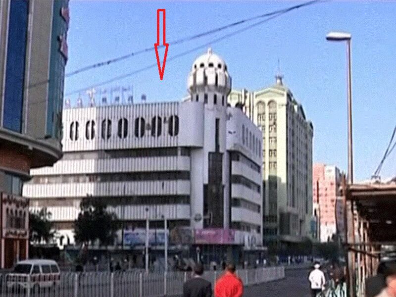 Shown by the arrow is Rebiya Kadir Mall in Urumqi, capital of China's Xinjiang Uyghur Autonomous Region, Sept. 9, 2009