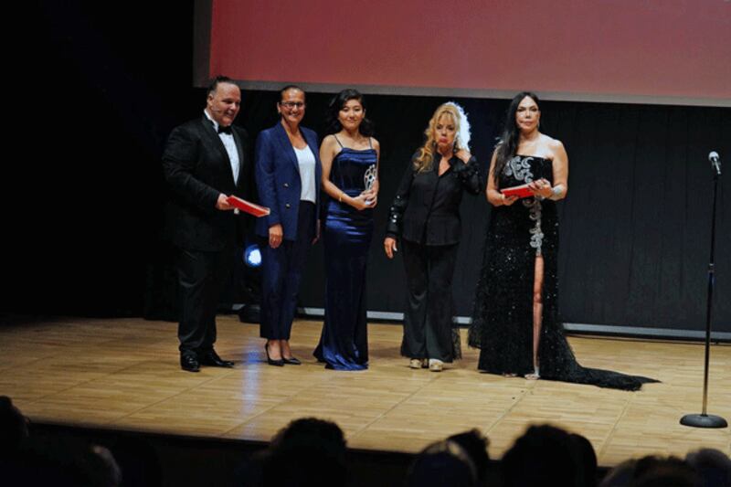 Güldiyar Tanridagli (3rd from L) receives the 'Best TV Series Music' award from Turkey's Film-San Foundation at a ceremony at Cemal Resit Rey Concert Hall in Istanbul, Sept. 9, 2024. (Provided by Güldiyar Tanridagli )