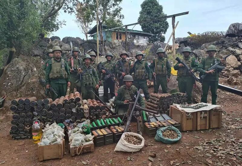 Members of the Myanmar National Democratic Alliance Army, MNDAA Pose with ammunition seized from Hkoke Htan military outpost in Kokang region on Nov. 16, 2023. Operation 1027 continues across Shan State with the Three Brotherhood Alliance and some people's defense forces Under the National Unity Government, NUG having taken nine towns, over 160 military camps, and now controlling key roads. Credit: The Kokang