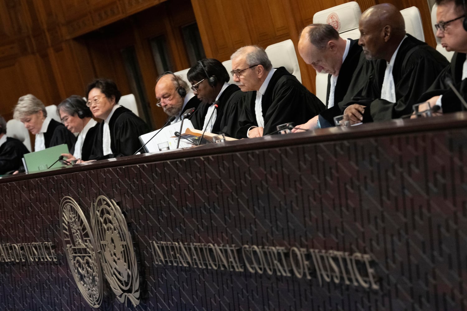 Presiding Judge Nawaf Salam (fourth from right) opens hearings into what countries are legally required to do to combat climate change at the International Court of Justice in The Hague, Netherlands on Dec. 2, 2024.