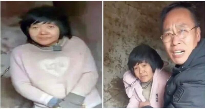 A woman identified as Yang Qingxia is shown sitting with a chain around her neck in a dilapidated hut at a rural property near Xuzhou city in the eastern province of Jiangsu , in a screenshot of a video that went viral on social media. Credit: Video via Douyin