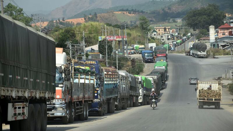 Loaded cargo trucks in Muse town in Myanmar wait to enter China in early 2021. (RFA)