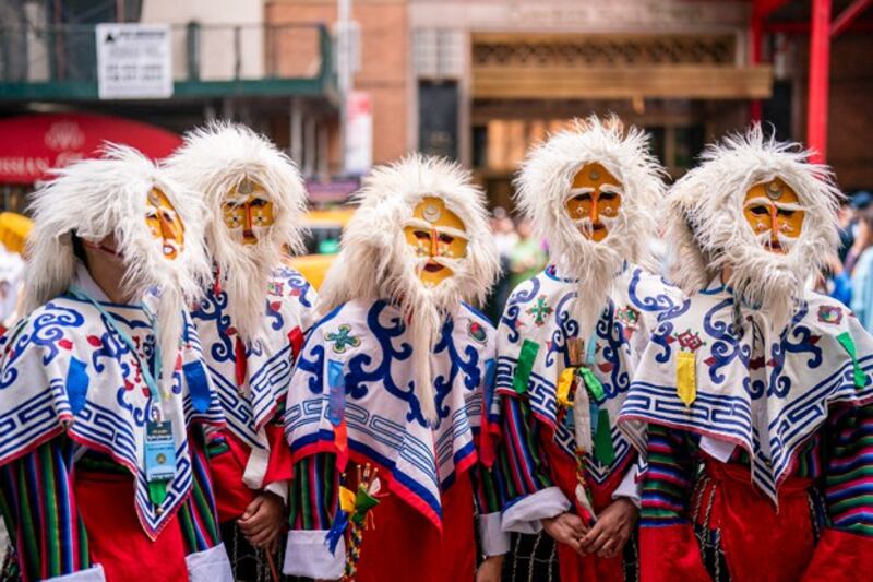 People await the arrival of the Tibetan spiritual leader, the Dalai Lama, at his hotel in New York before he undergoes knee surgery, June 23, 2024. (Adam Gray/AFP)