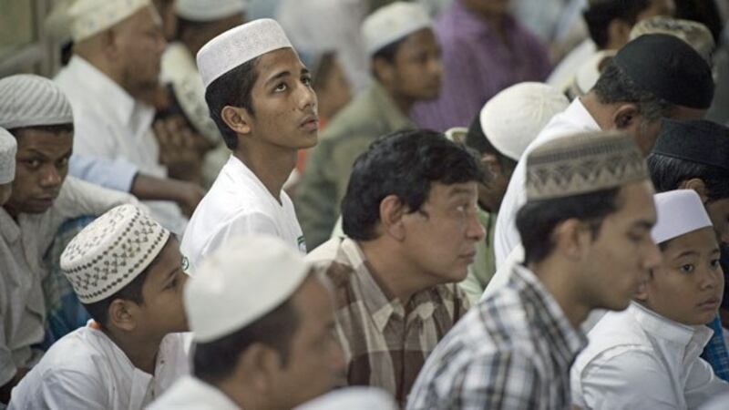 Muslim worshipers attend prayers at a mosque in Myanmar's commercial city Yangon, Nov. 6, 2015, two days before voters go to the polls to vote for lawmakers and the next government.