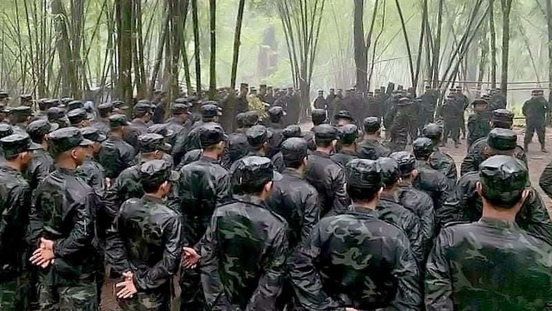 People's Defense Force (PDF) militia members stand at attention in an undated photo. NUG Ministry of Defense