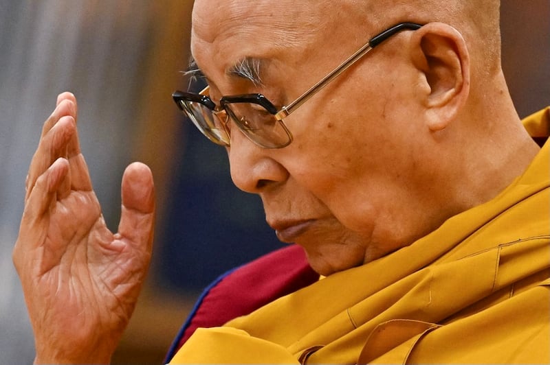 Tibetan spiritual leader Dalai Lama attends a long life prayer offered to him by his students and devotees at his temple in McLeod Ganj, some 10 Km from Dharamsala on October 25, 2023. (Photo by Money SHARMA / AFP)