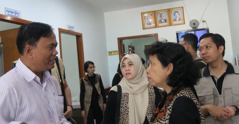 Cambodian psychiatrist Sotheara Chhim (left) works with physicians from Indonesia in Phnom Penh, in this undated handout photo provided by The Ramon Magsaysay Award Foundation on Aug. 31, 2022. Credit: Handout