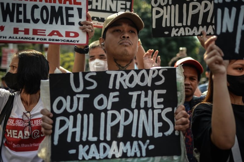 Filipino activists protest at the Mendiola Peace Arch outside the presidential Malacañang Palace in Manila ahead of a meeting between President Ferdinand Marcos Jr. and US Secretary of State Antony Blinken, March 19, 2024. (Jojo Riñoza/BenarNews)