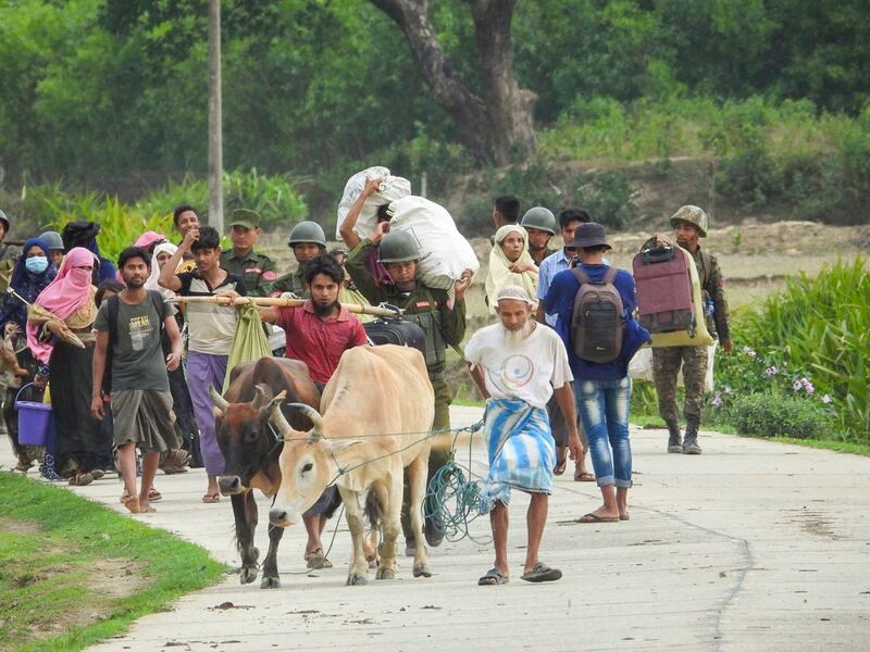 Rohingya people from Buthidaung township flee to Arakan Army (AA) controlled areas from armed clashes May 8, 2024. (United League of Arakan)