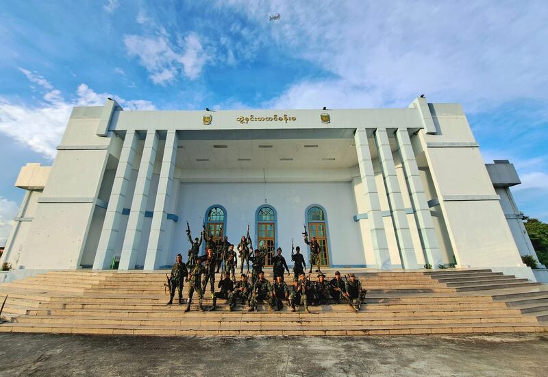 Members of the Karenni Nationalities Defense Force, KNDF pose in front of Loikaw University in Kayah State following their attack on junta forces on Nov. 15, 2023. Credit: KNDF