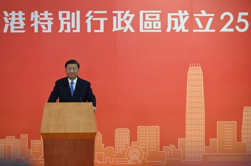 China's President Xi Jinping speaks following his arrival via high-speed rail across the border in Hong Kong on June 30, 2022, for celebrations marking the 25th anniversary of the city's handover from Britain to China. AFP