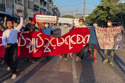 Youths protest military rule in Yangon, Dec. 8, 2021. RFA