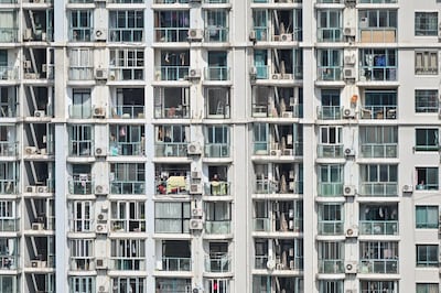 View of a residential building during a COVID-19 lockdown in the Jing'an district in Shanghai, April 8, 2022. Credit: AFP