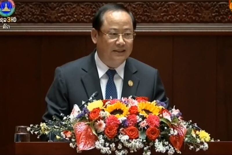 In this Dec. 30, 2022 screengrab from Laos state broadcaster Lao TV, new Laos Prime Minister Sonexay Siphandone addresses the national assembly in the capital Vientiane.