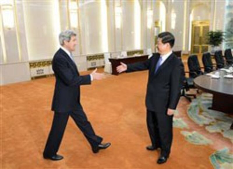 Ngoại trưởng John Kerry và chủ tịch Trung Quốc Tập Cận-bình - hurriyetdailynews phoyo