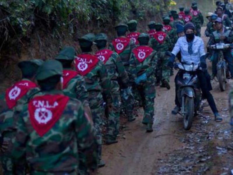 Rebels pass through a mountainous region of Myanmar's Shan state, March 11, 2015. Credit: Kokang volunteer