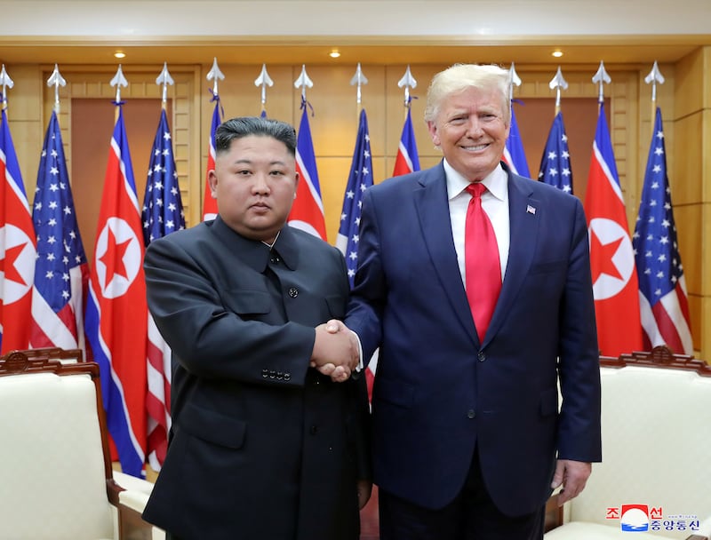 U.S. President Donald Trump shakes hands with North Korean leader Kim Jong Un as they meet at the demilitarized zone separating the two Koreas, in Panmunjom, South Korea, June 30, 2019.