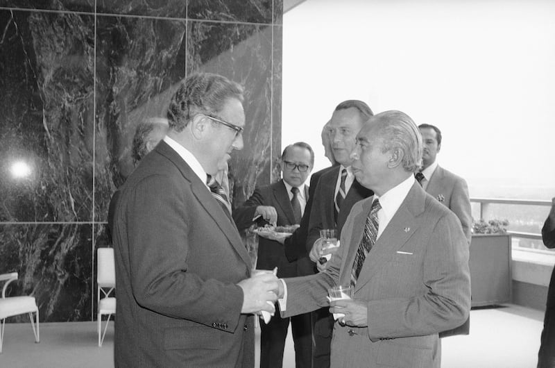 Secretary of State Henry Kissinger greets Indonesia Foreign Minister Adam Malik during a State Department luncheon in Malik's honor in Washington, D.C., June 29, 1976. (AP)