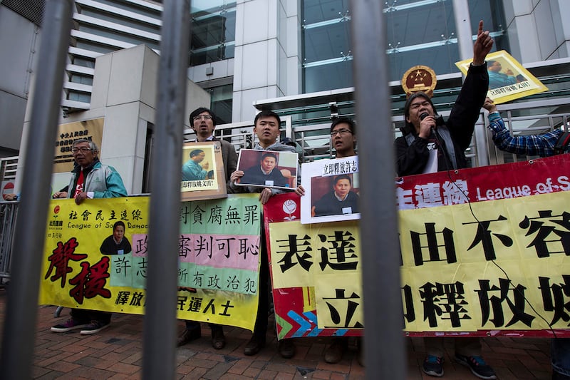 Pro-democracy lawmaker Leung Kwok-hung shouts during a protest calling for the release of Chinese rights advocate Xu Zhiyong, in Hong Kong on Jan. 27, 2014.