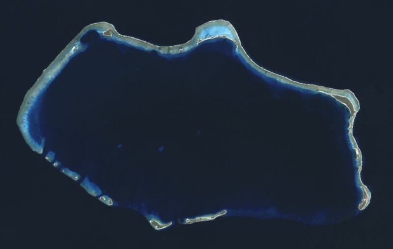 A true-color composite satellite image of Bikini Atoll, Marshall Islands, captured by NASA's Landsat 7 on January 14, 2001. Bikini Atoll. Two craters from high-yield atomic bomb tests can be seen on the northwest cape of the atoll, adjacent to Namu island. The larger is from the 15 Megaton Bravo shot, with the smaller 11 Megaton Romeo crater adjoining it.