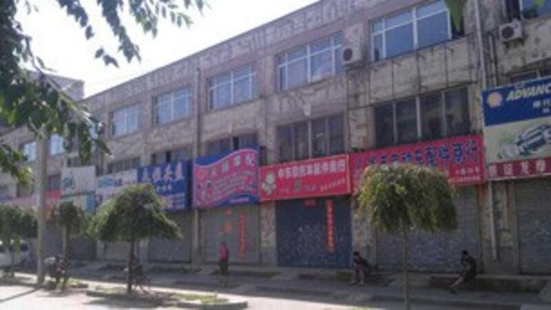 图片： 沈阳大部分店铺纷纷关门闭户。 （中国茉莉花革命网）