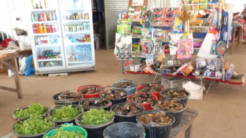 A photo shows a small food market in the Lao capital Vientiane, 2019.