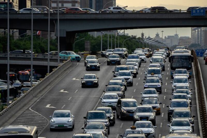 Rush hour traffic in Beijing's central business district, June 13, 2023. (Mark Schiefelbein/AP)