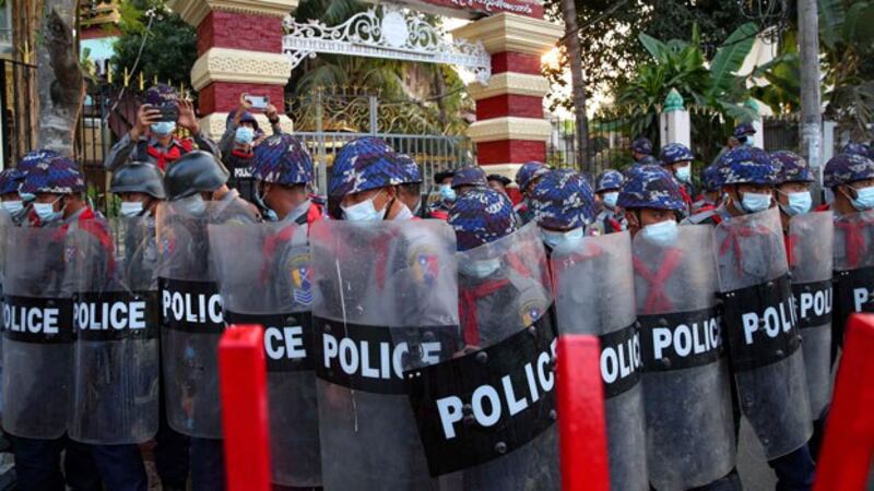 myanmar-police-shields-block-protesters-yangon-feb18-2021.jpg