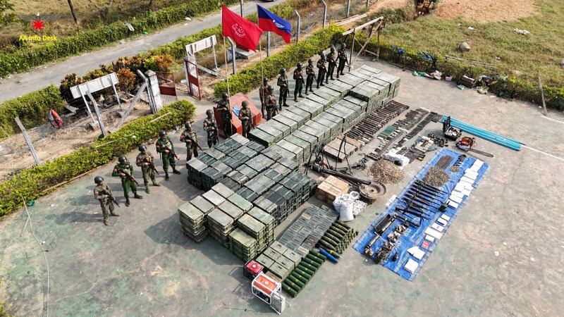 Arakan Army forces stand with captured arms and ammunition after recent fighting with Myanmar junta army units, Jan. 21, 2024. (AA Info Desk)