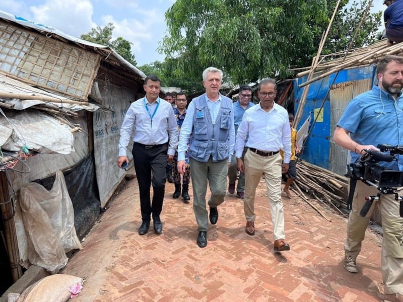 Filippo Grandi (center), the United Nations High Commissioner for Refugees, walks inside the Kutupalong refugee camp in Cox's Bazar district in Bangladesh, May 22, 2022. Credit: UNHCR.