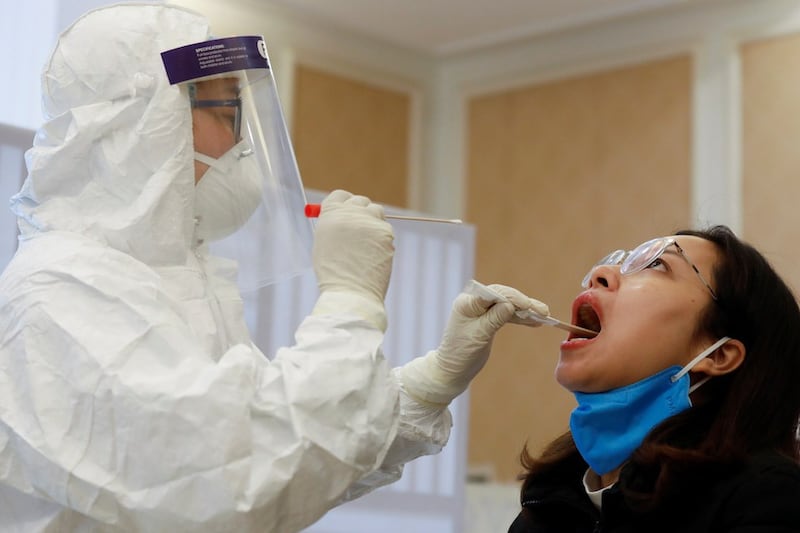 A woman is tested for coronavirus in Hanoi, Vietnam, January 25, 2021. Credit: Reuters