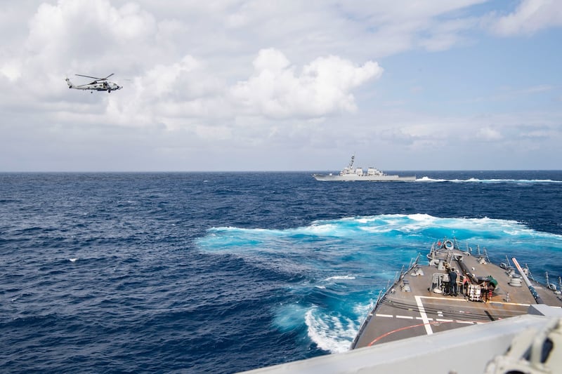 USS Benfold conducting freedom of navigation operation and participating in a drill in the South China Sea, Jan. 20, 2022. Credit: U.S. Navy