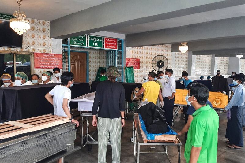 003Funeral coffins lining up for cremation at Yayway crematorium in Yangon on Jul 12_Credit Bo Sein (2).jpeg