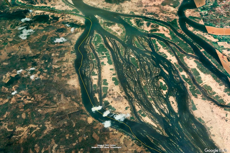 Google Earth Image taken March 16, 2024 of the Si Phan Don area of the Mekong River. The yellow line indicates the border between Cambodia, left, and Laos, right.