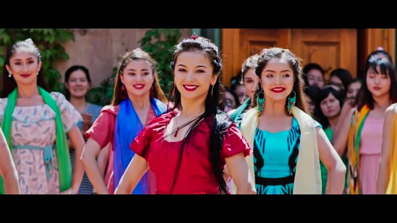 Uyghurs enjoy life in the XUAR in a frame grab from The Wings of Song. China Film Administration