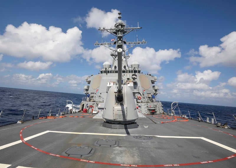 USS Benfold conducting freedom of navigation operation and participating in a drill in the South China Sea, Jan. 20, 2022. Credit: U.S. Navy