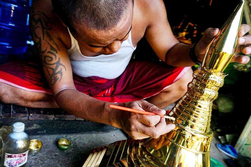 A worker does some touchup on a project. (Myo Min Soe/RFA)