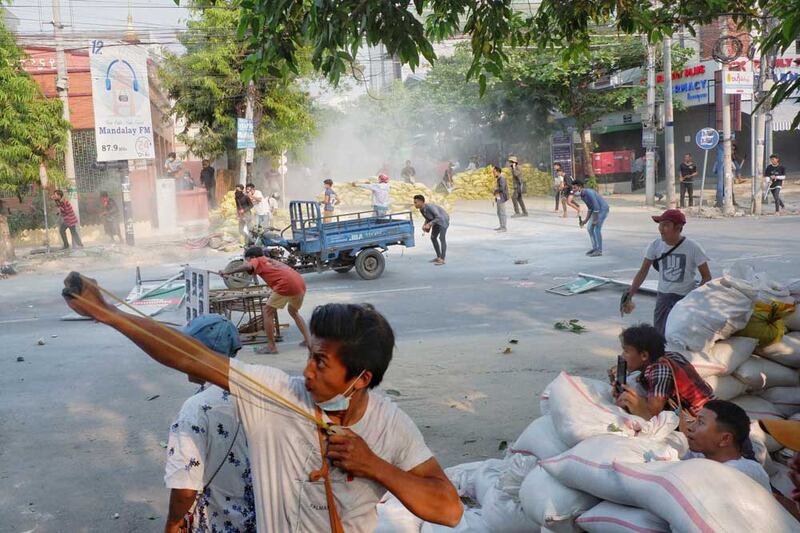 Small, traditional slingshots also are being used. Reuters photo