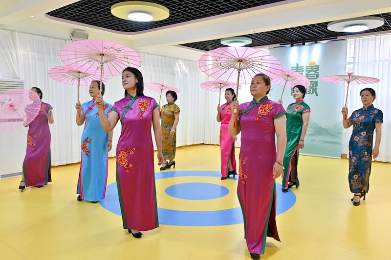 Participants practice a dance at a kindergarten-turned-elderly center in Taiyuan, in China's northern Shanxi province, July 2, 2024. (Adek Berry/AFP)