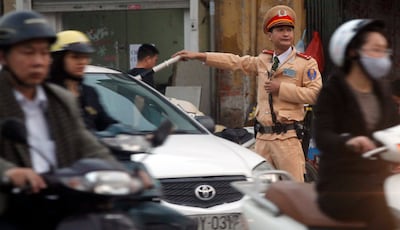 2013-03-06T120000Z_1251381475_GM1E9361RHE01_RTRMADP_3_VIETNAM-POLICE.JPG