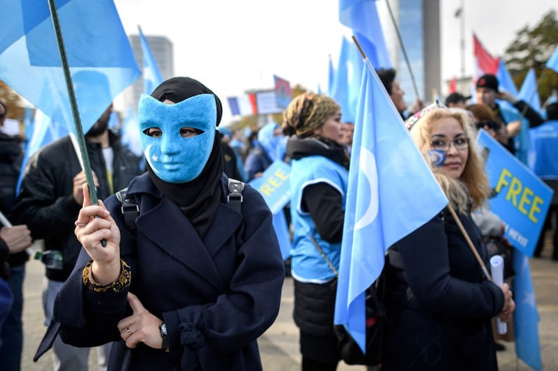 Uyghurs demonstrate against China outside of the United Nation offices during the Universal Periodic Review of China by the U.N. Human Rights Council, on Nov. 6, 2018 in Geneva, Switzerland. Credit: AFP.