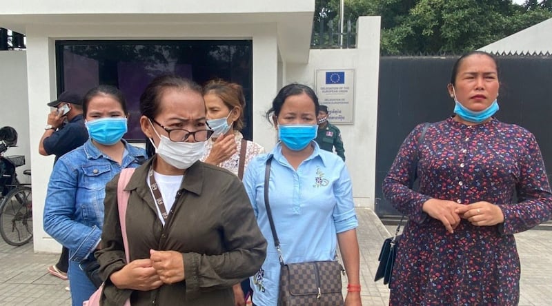 Wives of Cambodian opposition party members held in Prey Sar Prison leave the EU embassy in Phnom Penh after meeting with embassy officials, Aug. 10, 2020.