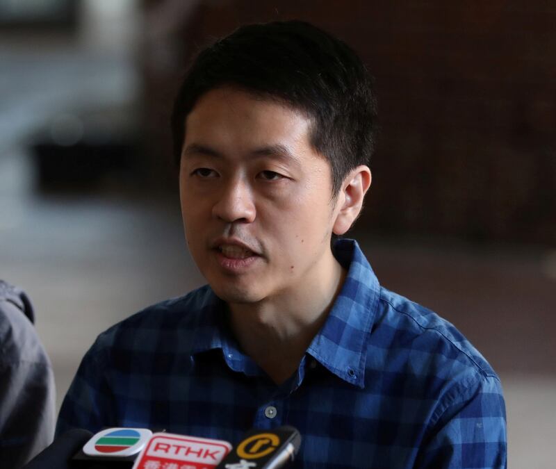 Then-District Councilor Ted Hui delivers a statement to the media at Hong Kong Polytechnic University in Hong Kong, Nov. 27, 2019. (Leah Millis/Reuters)