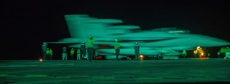 Sailors direct an EA-18G Growler attached to the Shadowhawks of Electronic Attack Squadron (VAQ) 141 on the flight deck of the U.S. Navy's only forward-deployed aircraft carrier USS Ronald Reagan (CVN 76) in the Philippine Sea, Aug. 2, 2022. Credit: U.S. Navy