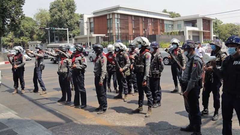 myanmar-police-patrol-street-us-embassy-yangon-feb23-2021.jpg