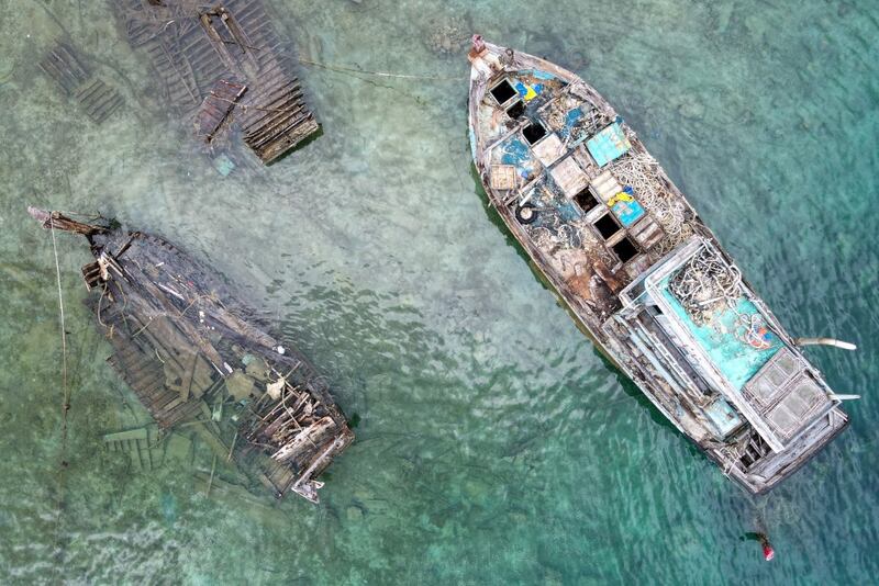 Broken ships are visible during the ASEAN Solidarity Exercise Natuna 2023 involving  Indonesia, Singapore, Malaysia, Thailand, Vietnam and Laos on Natuna waters in Indonesia’s Riau Islands province, Sept. 21, 2023. [Bay Ismoyo/AFP]