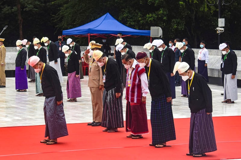 Vice-Senior Gen. Soe Win (front), vice-chairman of the junta, salutes with officials at the tomb of Myanmar's independence hero Gen. Aung San during a ceremony to mark the 75th anniversary of his 1947 assassination, at the Martyrs' Mausoleum in Yangon, July 19, 2022. Credit: Myanmar Ministry of Information via AP