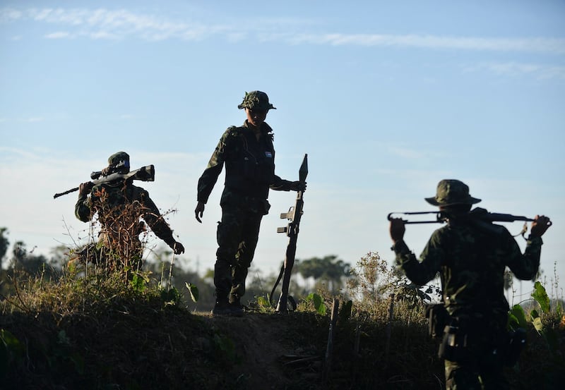 Members of the People's Defence Forces (PDF) who became guerrilla fighters are seen on the front line in Kawkareik, Myanmar, Dec. 31, 2021. Credit: Reuters